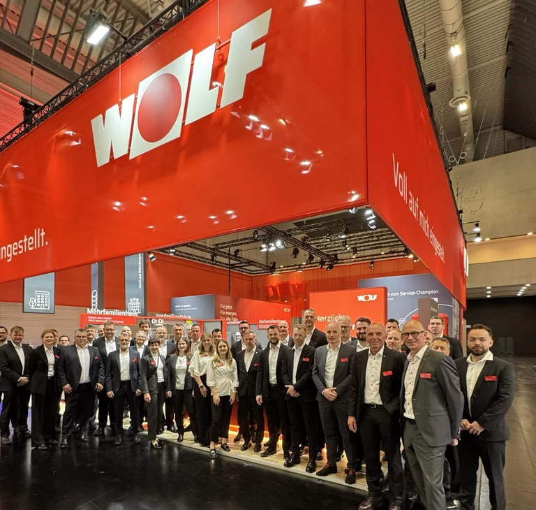 WOLF Messestand auf der IFH/Interm mit rotem Banner